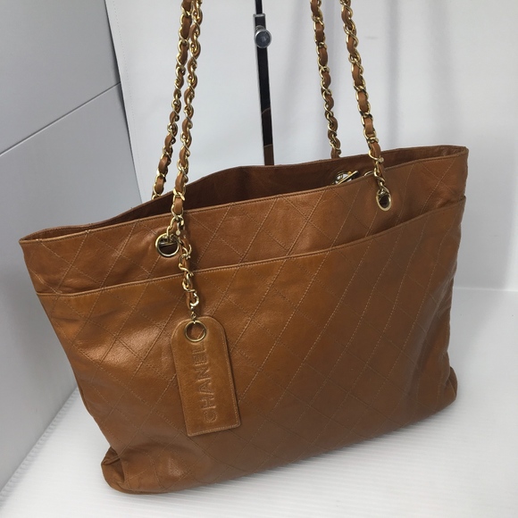 CHANEL Handbags - Authentic Chanel Quited CC Logo Charm Shopper Tote